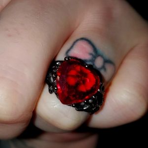Red 3D heart shaped ring with black band size 6